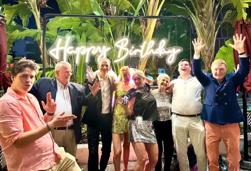 Group of people celebrating a birthday.